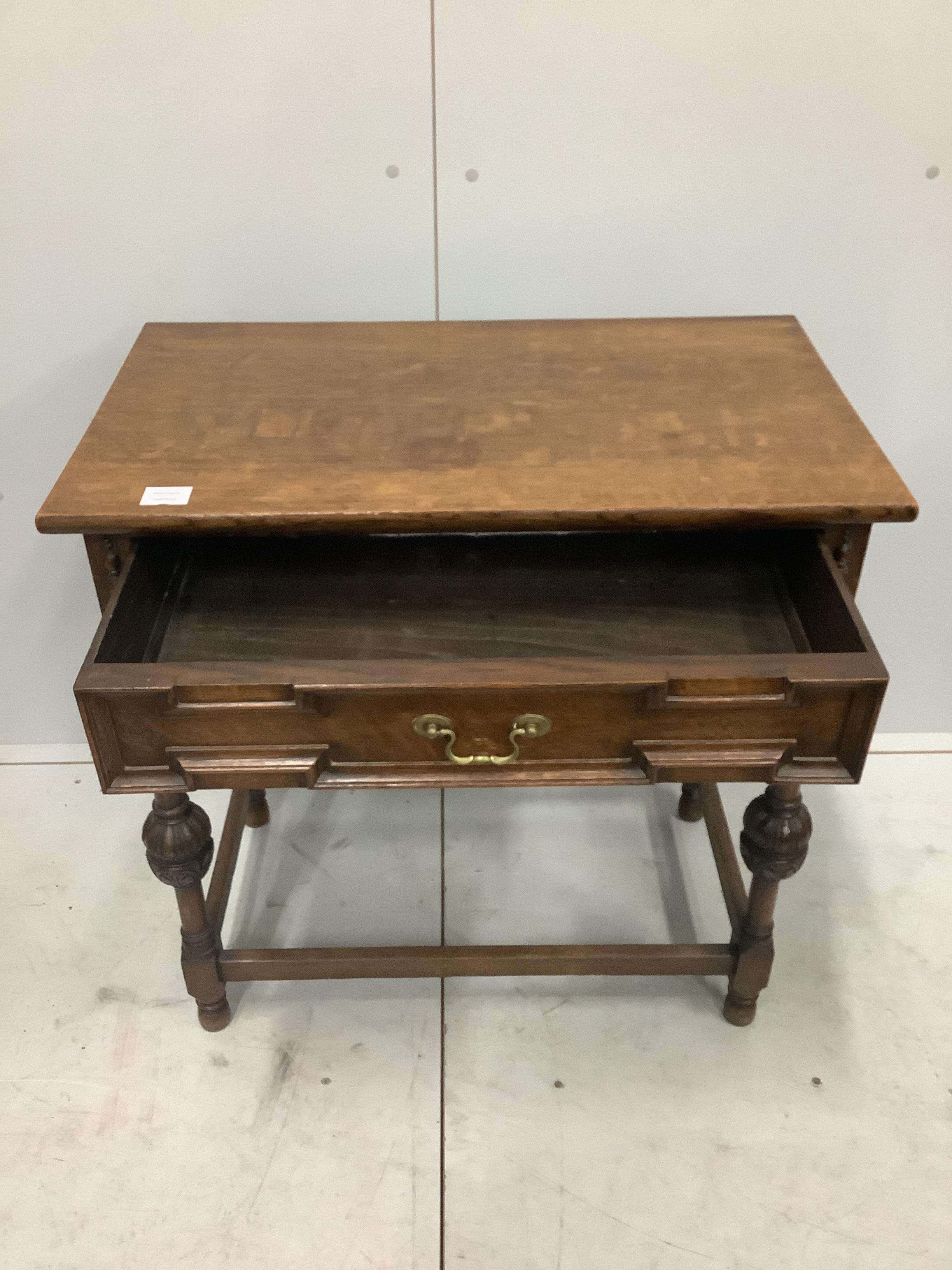 A Jacobean Revival oak side table, width 75cm, depth 45cm, height 76cm